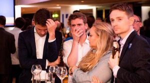 A note about the photo – it shows two Lib Dem activists, Naomi Smith and Paul Pettinger, on the right, after the Brexit result was announced. This photo has been published in media around the world; an iconic image of the shock experienced by Remain campaigners.